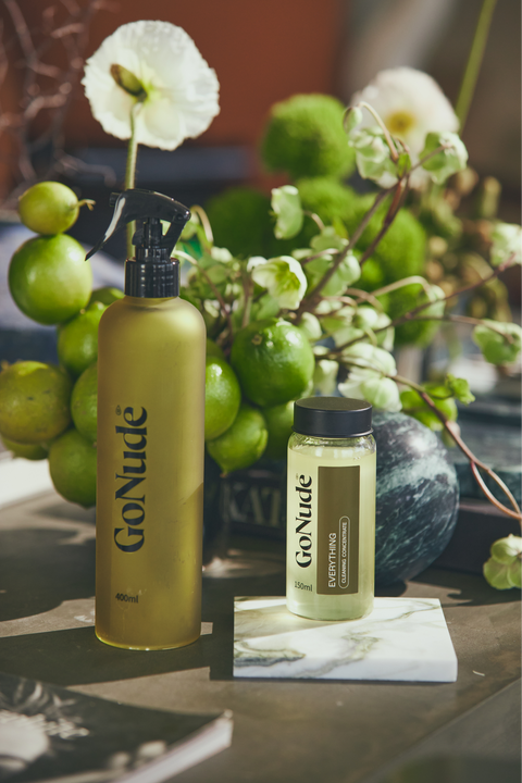 Go Nude Everything Surface Cleaner concentrate and Olive Keeper bottle lifestyle