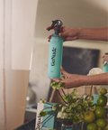 Spraying Go Nude Glass & Mirror Cleaner
